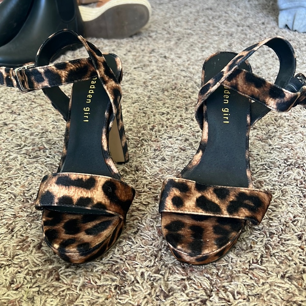 Selling Cheetah heels. Size 8 and they are not worn.
